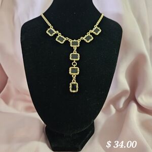 Elegant Gold and Black Necklace